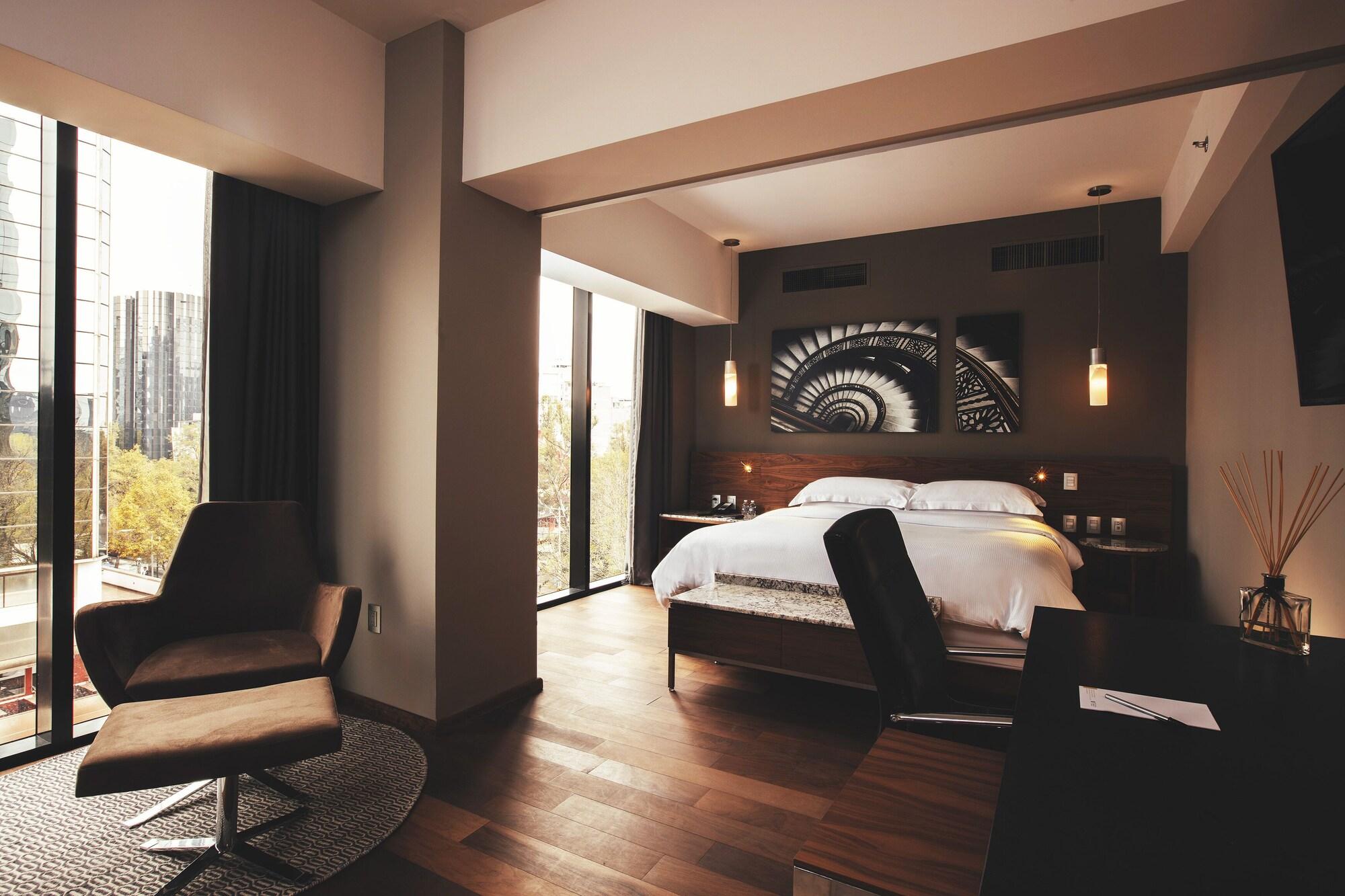 Krystal Grand Suites Insurgentes Mexico City Luaran gambar A bedroom at the hotel